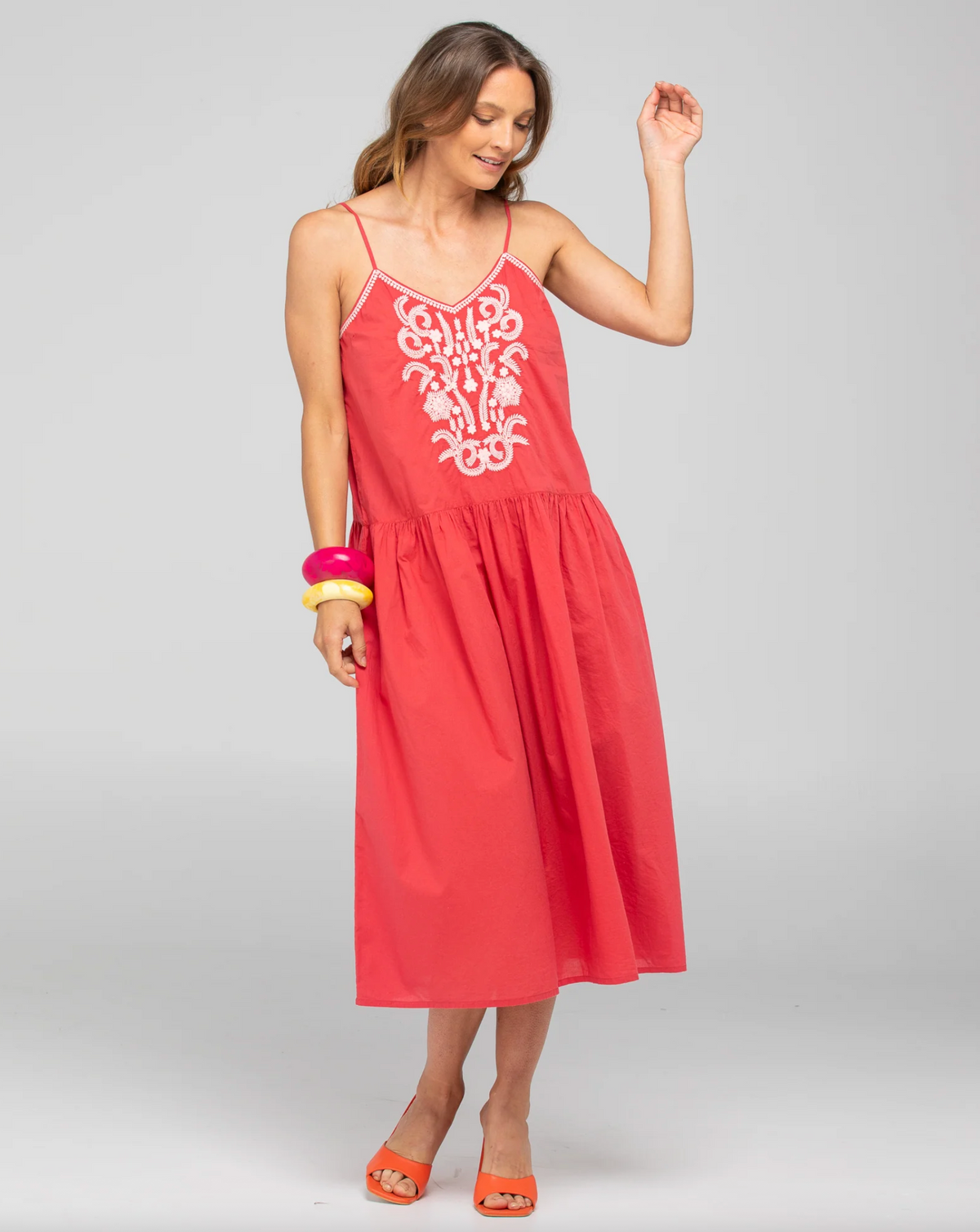 Ahana midi dress by boom shankar is a red cotton strappy dress with pink embroidery