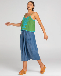 ahana singlet by boom shankar is a grren cotton top with turquoise embroidery