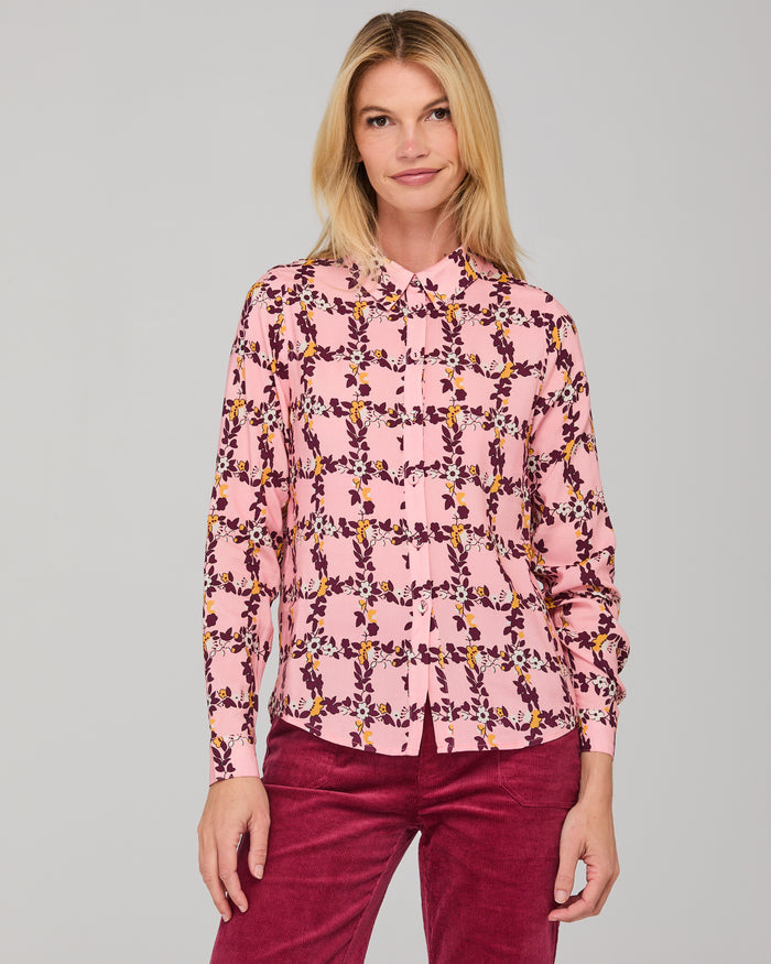 The Akane Shirt by Boom Shankar is a timeless boho piece featuring delicate floral prints and button up the front