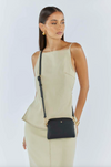 alias mini crossbody bag by peta and jain is a vegan leather small bag that converts to a clutch