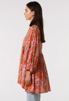 a vibrant boho floral block print tunic top with sleeves