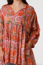 a vibrant boho floral block print tunic top with sleeves