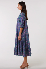 a purple and blue floral bohemian block print cotton dress