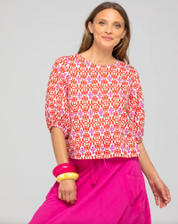 the ava top by boom shankar is a red and white block print  cotton top