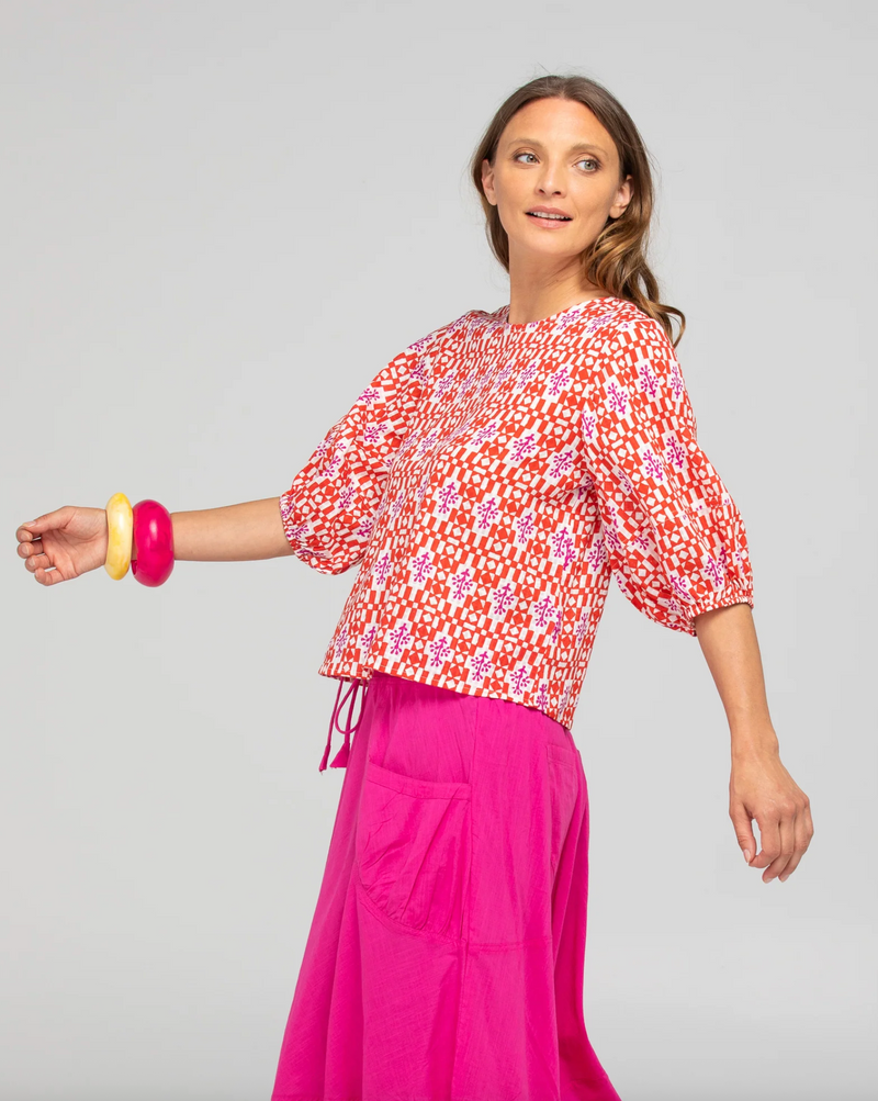 the ava top by boom shankar is a red and white block print  cotton top