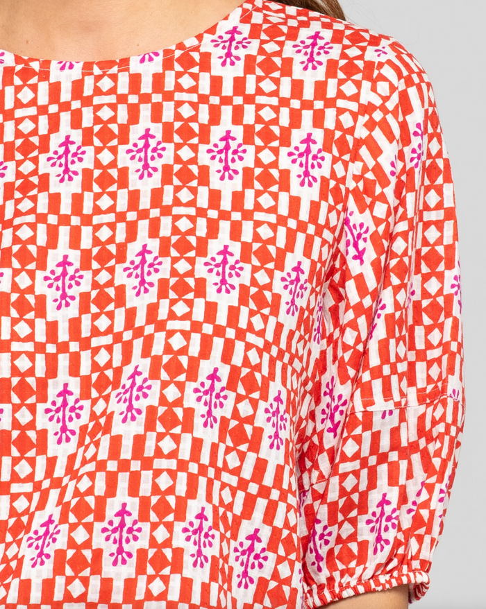 The Ava Top by Boom Shankar is made from soft, breathable cotton, made ethically in India and a fun block print pattern in red and white