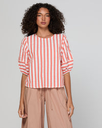 The Ava top by Boom Shankar is a washed watermelon and white stripe cotton seersucker blouse for women