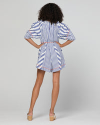 Lucia playsuit by Boom Shankar is a blue and white striped short suit made from cotton seersucker