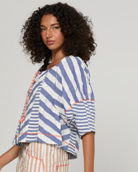 The Lucia Top by Boom Shankar is a washed blue and white stripe cotton seersucker blouse for women