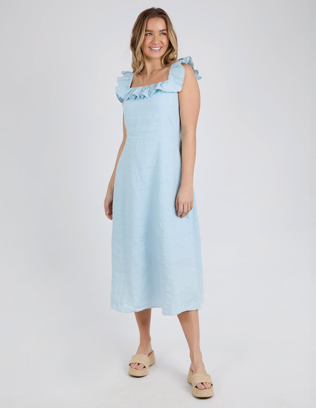 the bonifacio dress by foxwood is a linen blend flattering sun dress and is sleeveless in pale blue