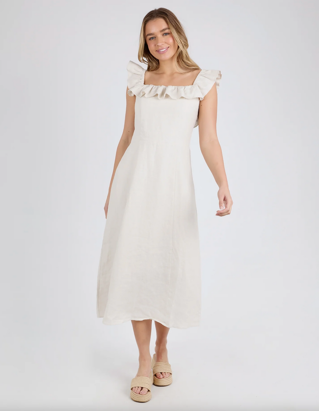 the bonifacio dress by foxwood is a linen blend flattering sun dress and is sleeveless in a natural tone