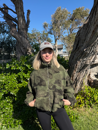 The ultimate comfort in the Camo Teddy Bomber Jacket By Frankie. Crafted from cozy sherpa fleece fabric, it's the perfect layering piece for winter.