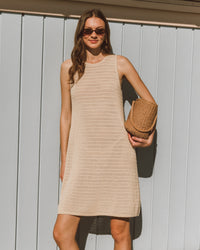 a cotton beige crocheted sleeveless summer dress