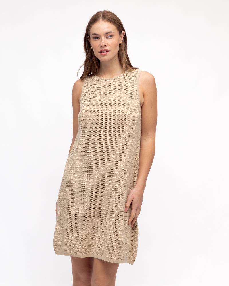 a cotton beige crocheted knee length dress