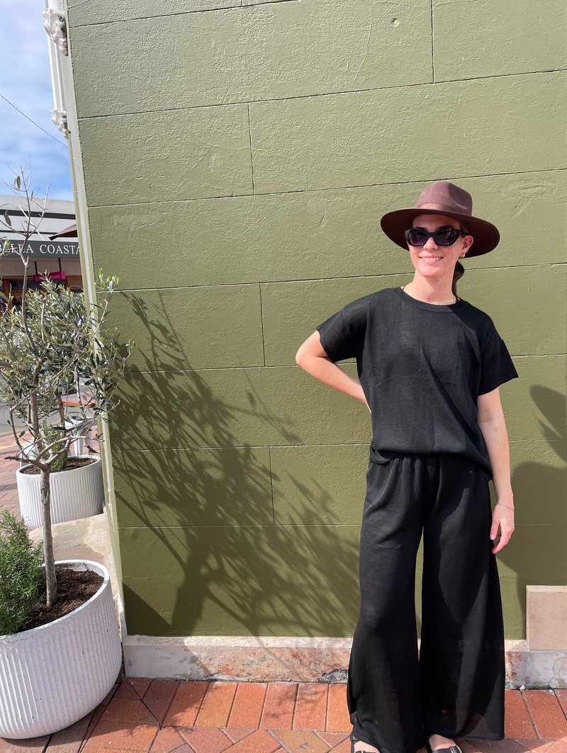 the coast tee by little lies is a black knitted linen summer top with matching coast pants