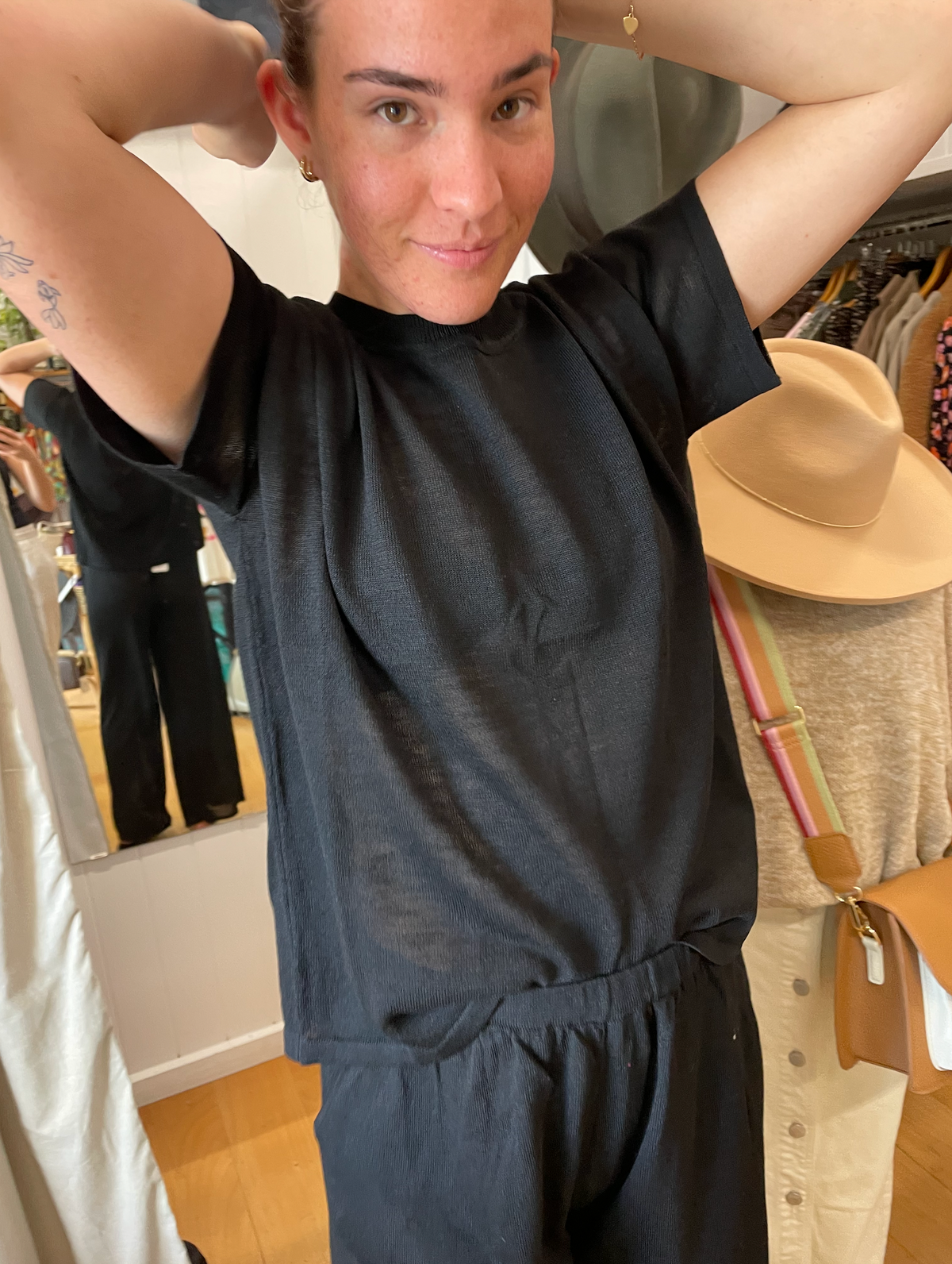 the coast tee by little lies is a black knitted linen summer top