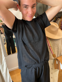 the coast tee by little lies is a black knitted linen summer top
