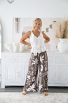 chocolate brown and white printed rayon wide leg pants by salty bright