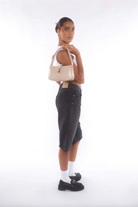 connor shoulder bag in beige by peta and jain