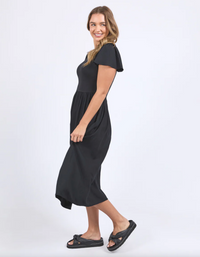 The Elle Dress by Foxwood is the perfect little black midi dress for spring and summer