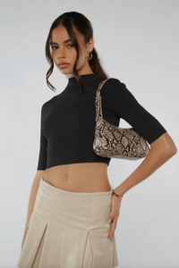gabi shoulder bag by peta and jain is a vegan leather zip up small bag