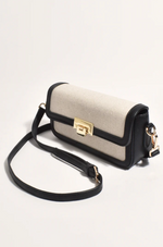 the hattie fabric weave shoulder bag by adorne in black and cream