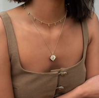 gold harmony pendant necklace with mother of pearl by murkani