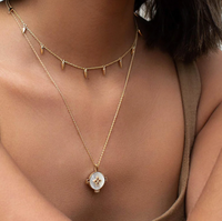 gold harmony pendant necklace with mother of pearl by murkani