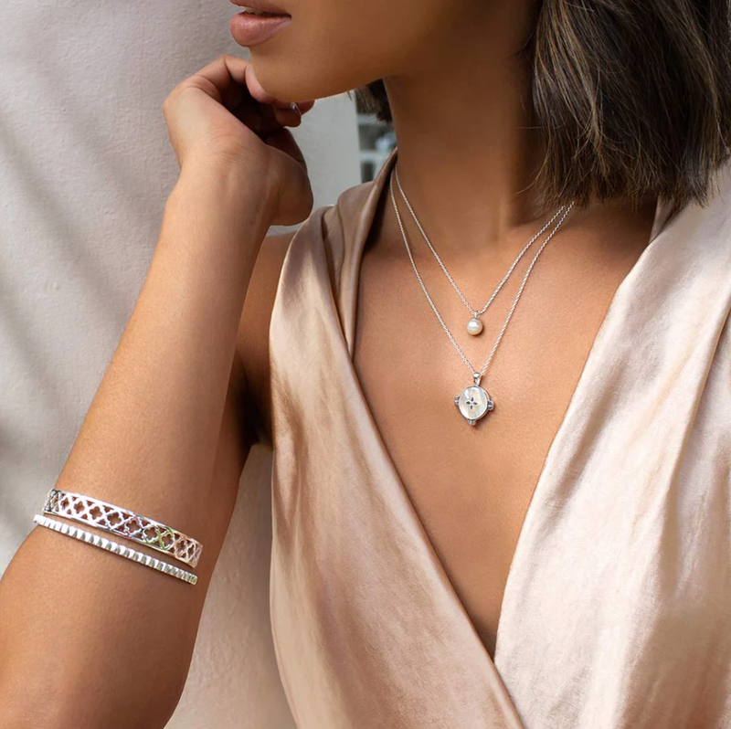 harmony necklace by murkani is a sterling silver chain with mother of pearl inlay pendant