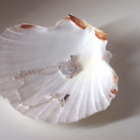 harmony necklace by murkani is a sterling silver chain with mother of pearl inlay pendant