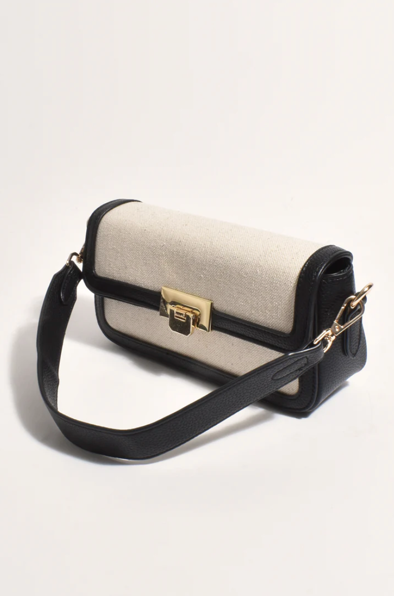 the hattie fabric weave shoulder bag by adorne in black and cream