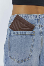 izzy card wallet by peta and jain is a vegan card holder in chocolate