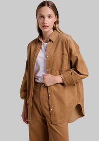 Khatie cord shirt by ittle lies is a cotton corduroy long sleeve collared button up shirt in camel