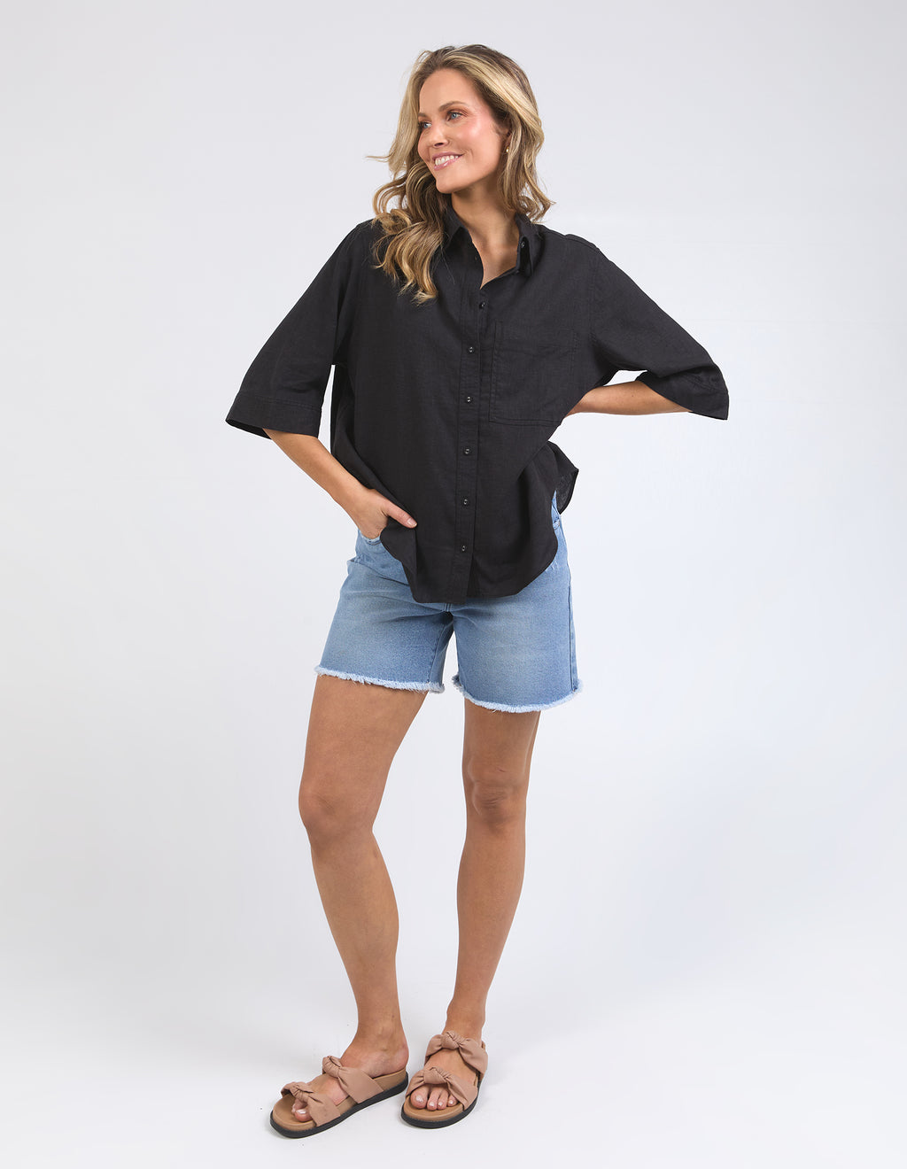 the leah shirt by foxwood is a linen blend flowing elegant black button up shirt