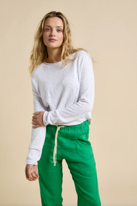 green linen luxe pants with white nellie top by little lies
