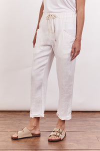 Little Lies linen luxe pants in white with elastic waist and pockets