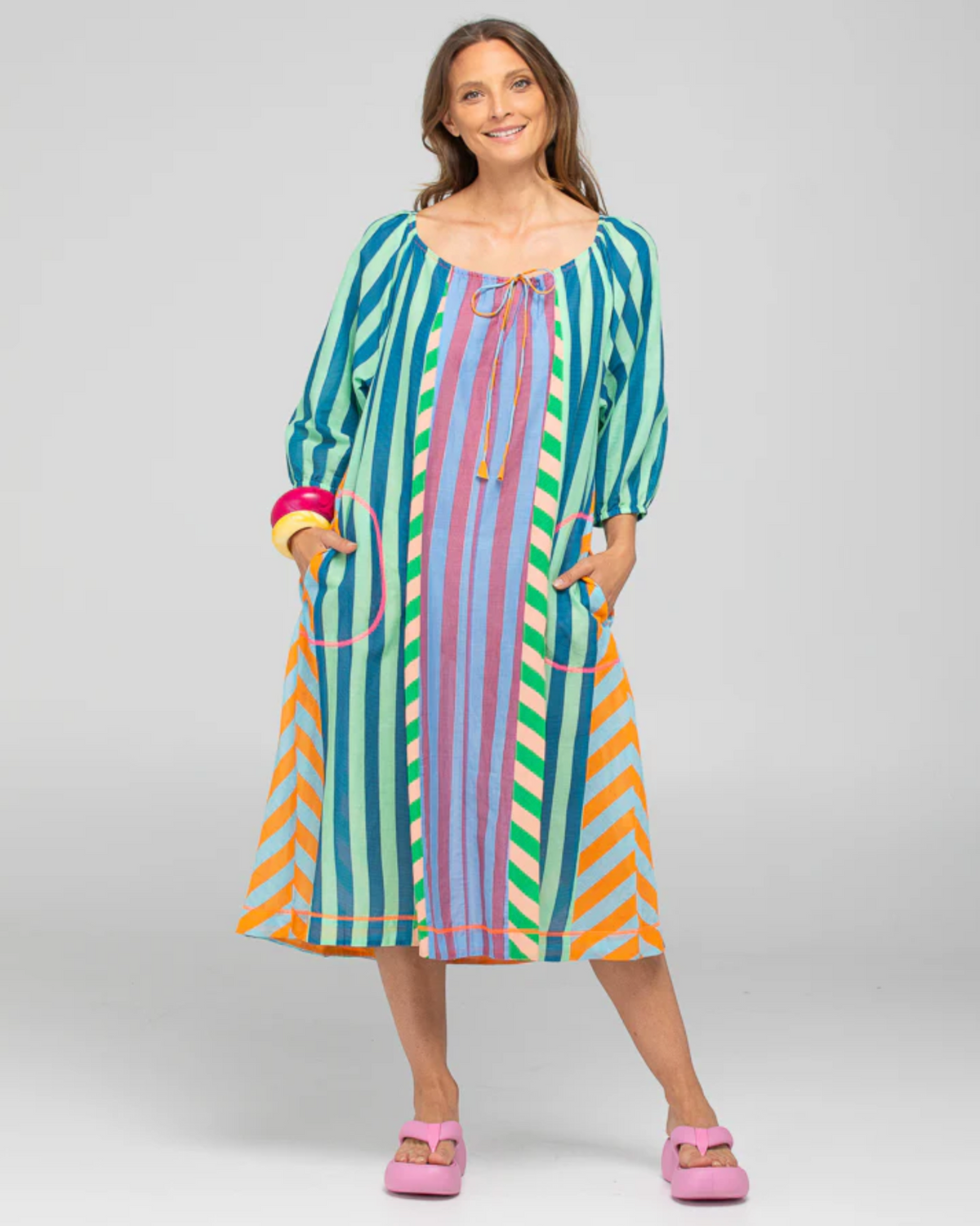 The Lucia midi dress by Boom Shankar is a cotton stripe A-line dress with pockets