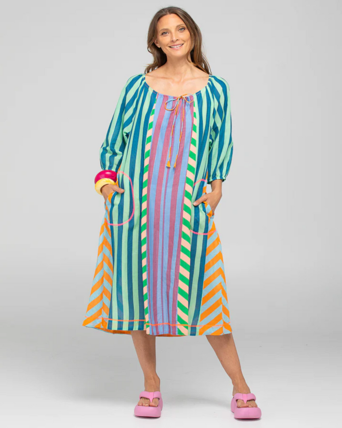 The Lucia midi dress by Boom Shankar is a cotton stripe A-line dress with pockets
