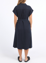 lucia dress by foxwood is a classic black linen dress belted at the waist and midi length