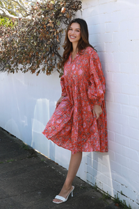 a cotton block print floral boho dress by Peacock feather above the knee