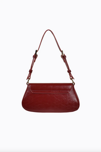the nikki shoulder bag by peta and jain in cherry red