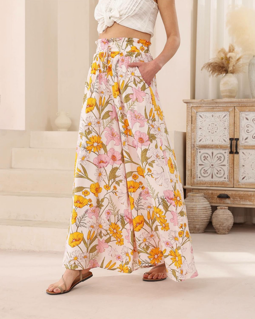 a pair of floral boho wide leg pants by iris maxi