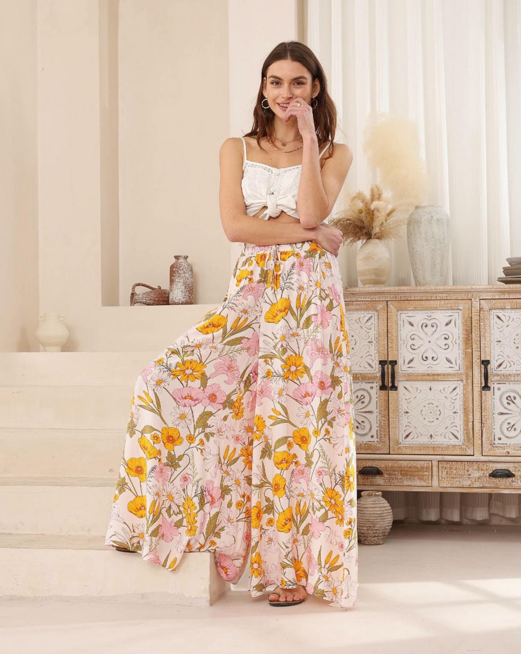 a pair of floral boho wide leg pants by iris maxi