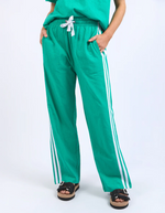 a sporty style pull green and white on pants by foxwood