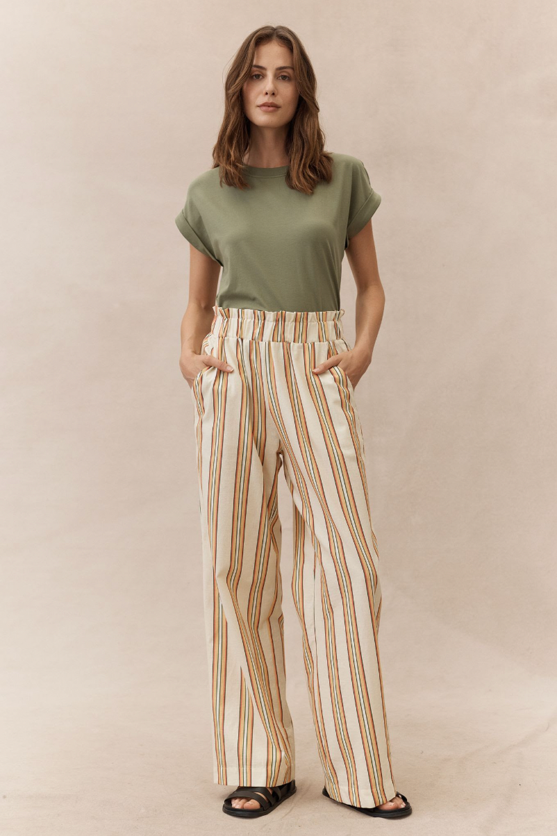 the rhodes tee by little lies is a super soft t shirt with a rolled sleeve in high quality cotton blend in khaki