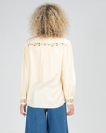 the rosemary top by boom shankar is a feminine linen blend embroidered shirt in cream