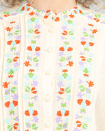 the rosemary top by boom shankar is a feminine linen blend embroidered shirt in cream