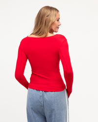 The Sita Long Sleeve Top by Paper Heart is your go-to piece for effortless layering. Crafted from super soft, stretchy fabric in vibrant red.