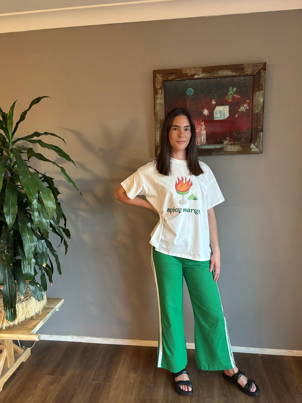 Spicy Marg Pants by frankie are green linen pants with white side stripes and pockets