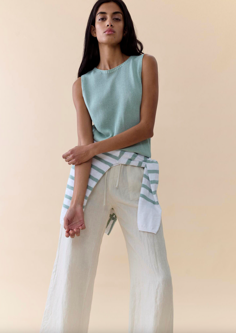 the spring tabnk by little lies is a sleeveless knitted top in duck egg blue